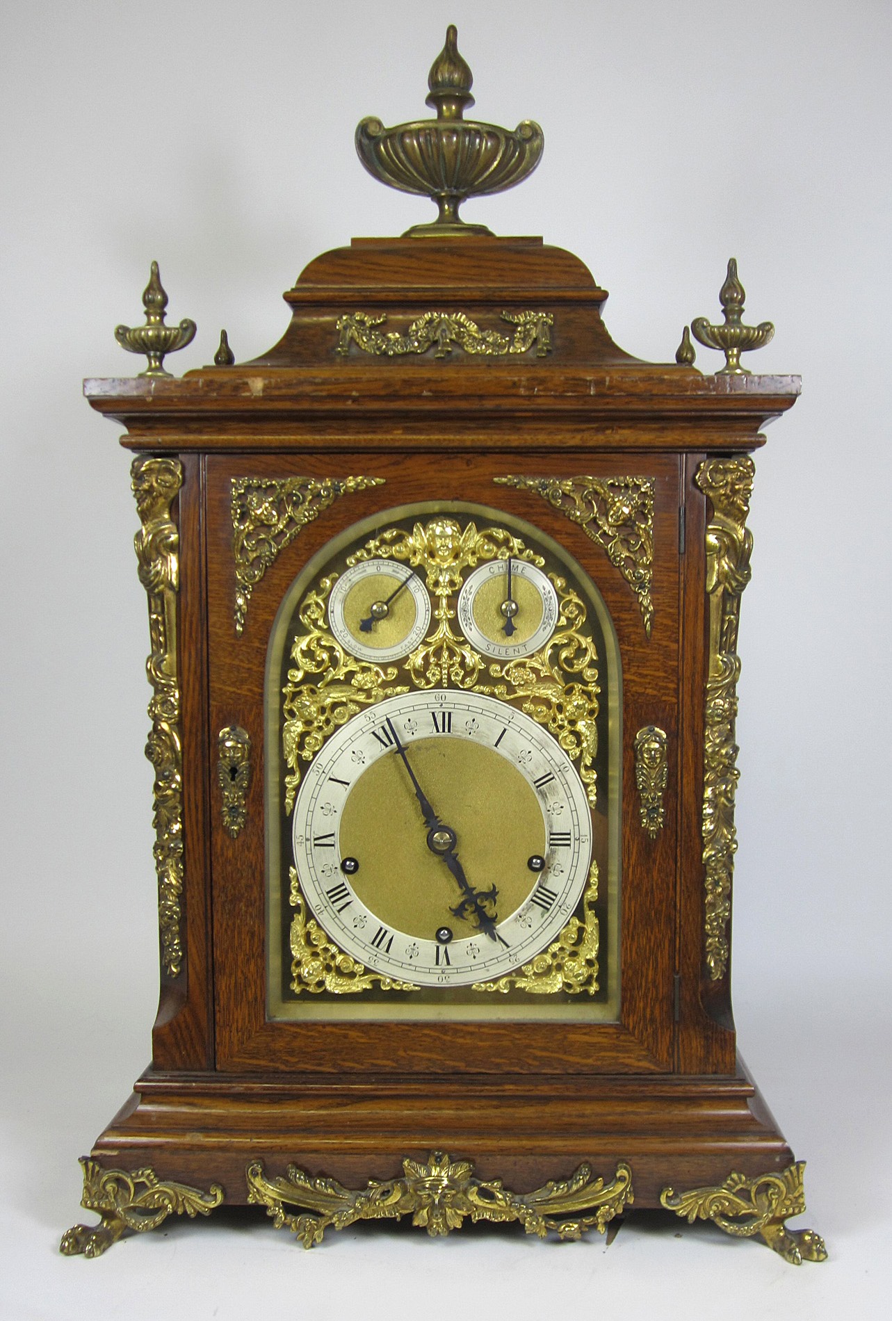 GERMAN OAK AND GILT METAL BRACKET CLOCK AND BRACKET, BY WINTERHALDER AND HOFMEIER