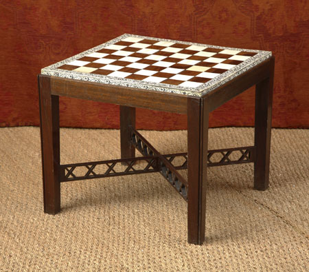 A 19th century Indian rosewood and ivory chess board