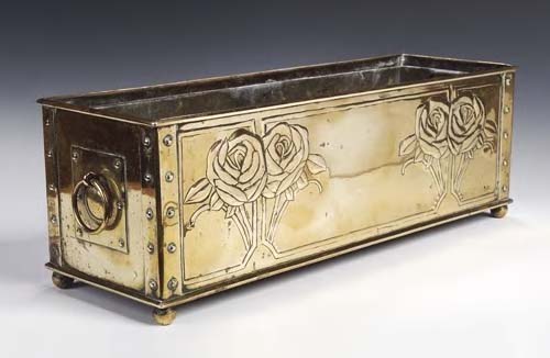 A Scottish School Arts and Crafts brass planter,