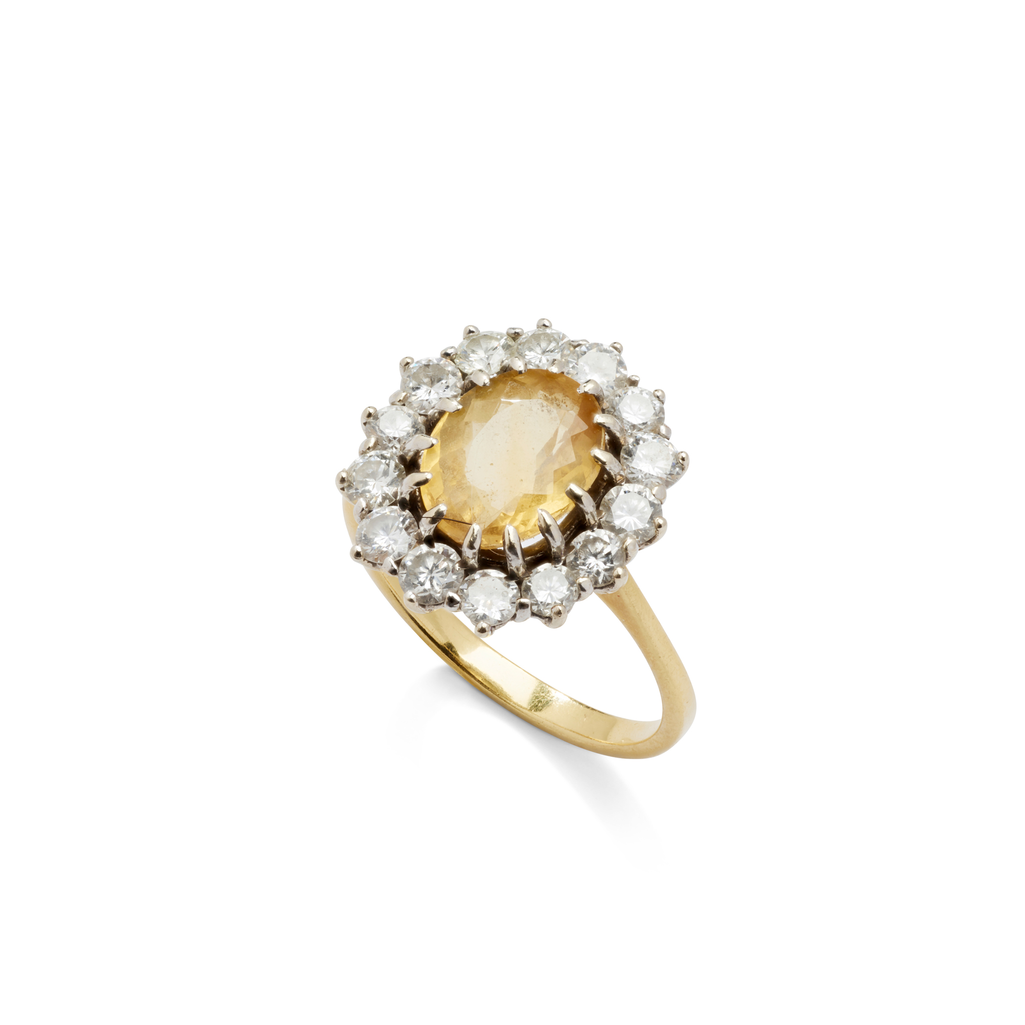 An orange topaz and diamond cluster ring