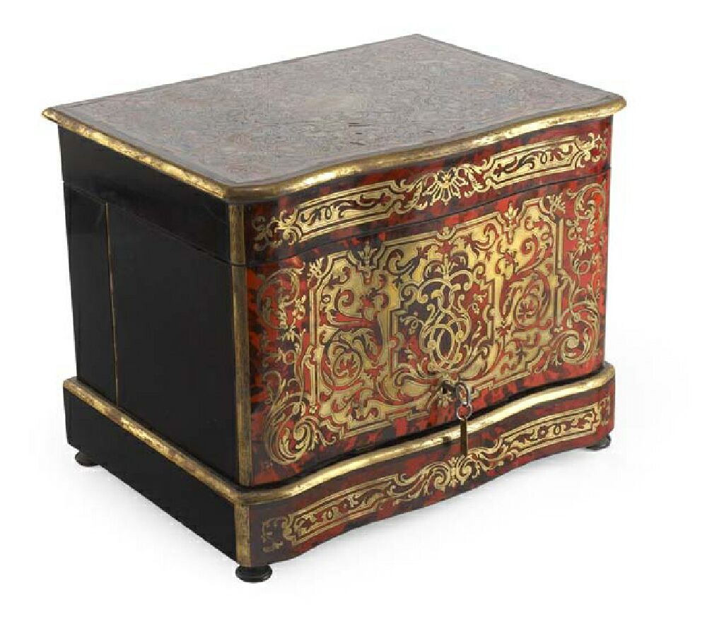A Napoleon III period Boulle and ebonised serpentine tantalus