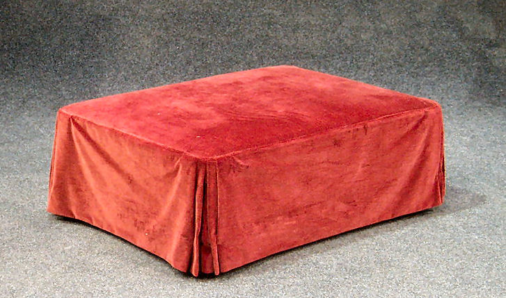A rectangular ottoman