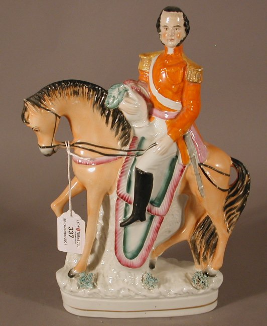 A Staffordshire figure of a soldier on horseback