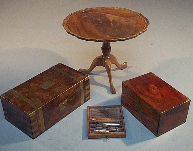 A mahogany occasional table