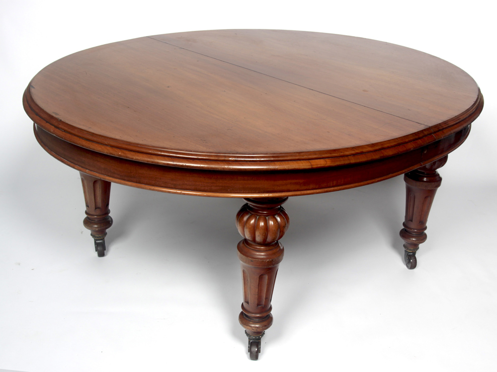 A Victorian mahogany extending dining table