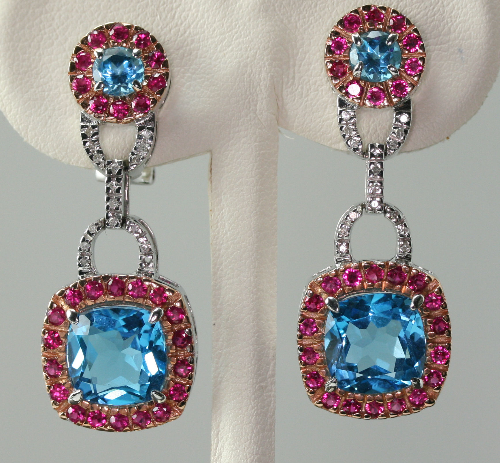 A pair of multi-gem set pendant earrings