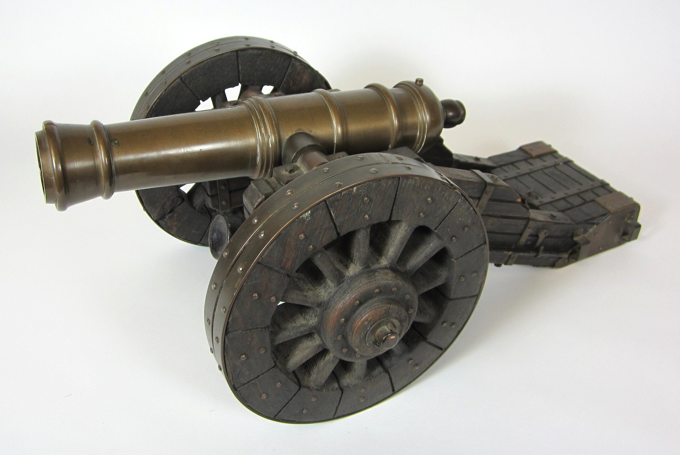 MINIATURE OAK AND BRASS CANNON