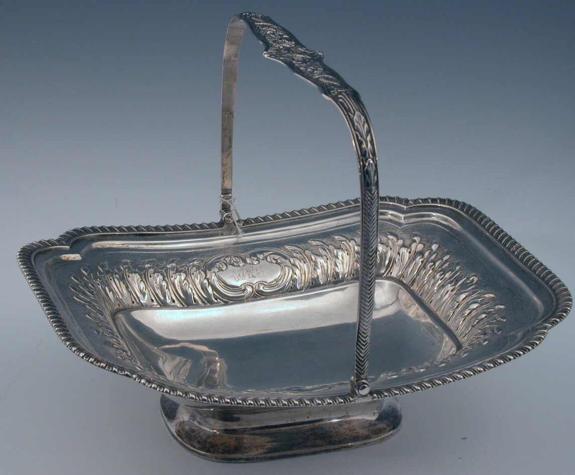 A George III swing handled fruit basket,