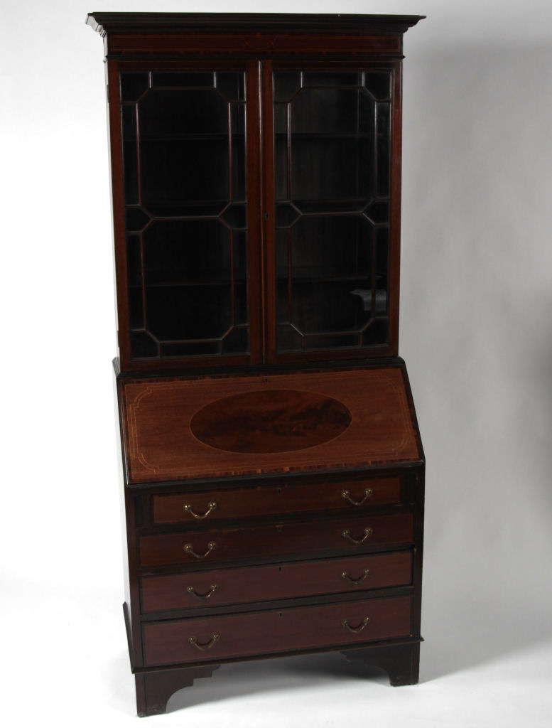 An Edwardian inlaid mahogany bureau bookcase