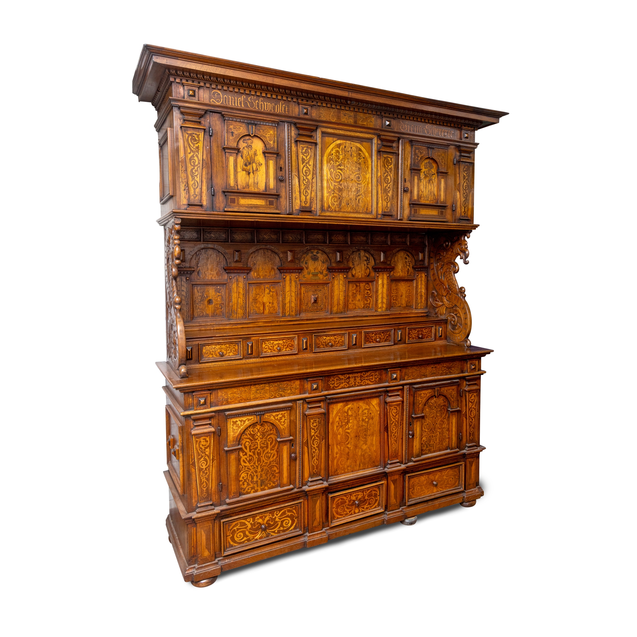 A CONTINENTAL OAK, WALNUT AND INLAID SIDEBOARD