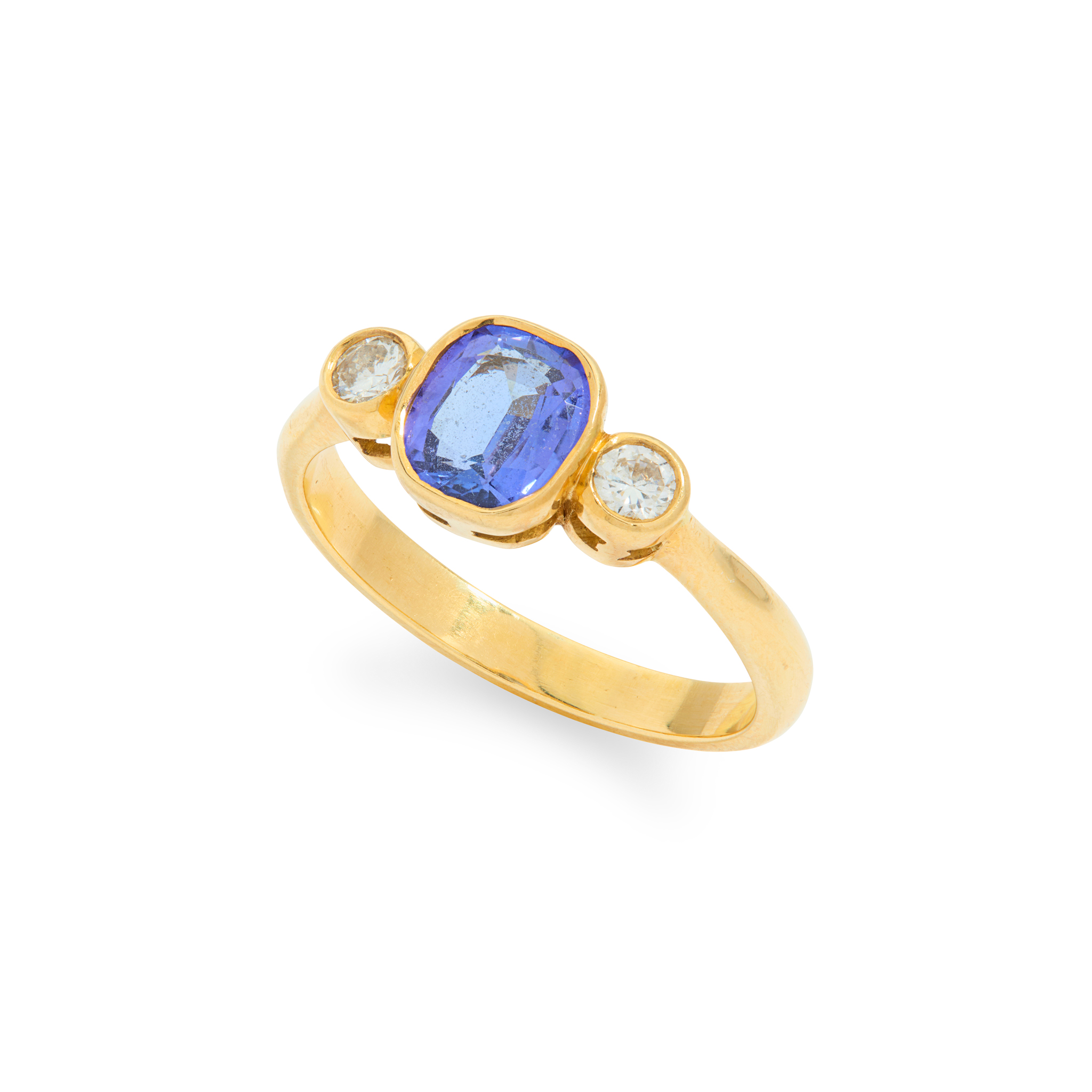 A tanzanite and diamond three-stone ring
