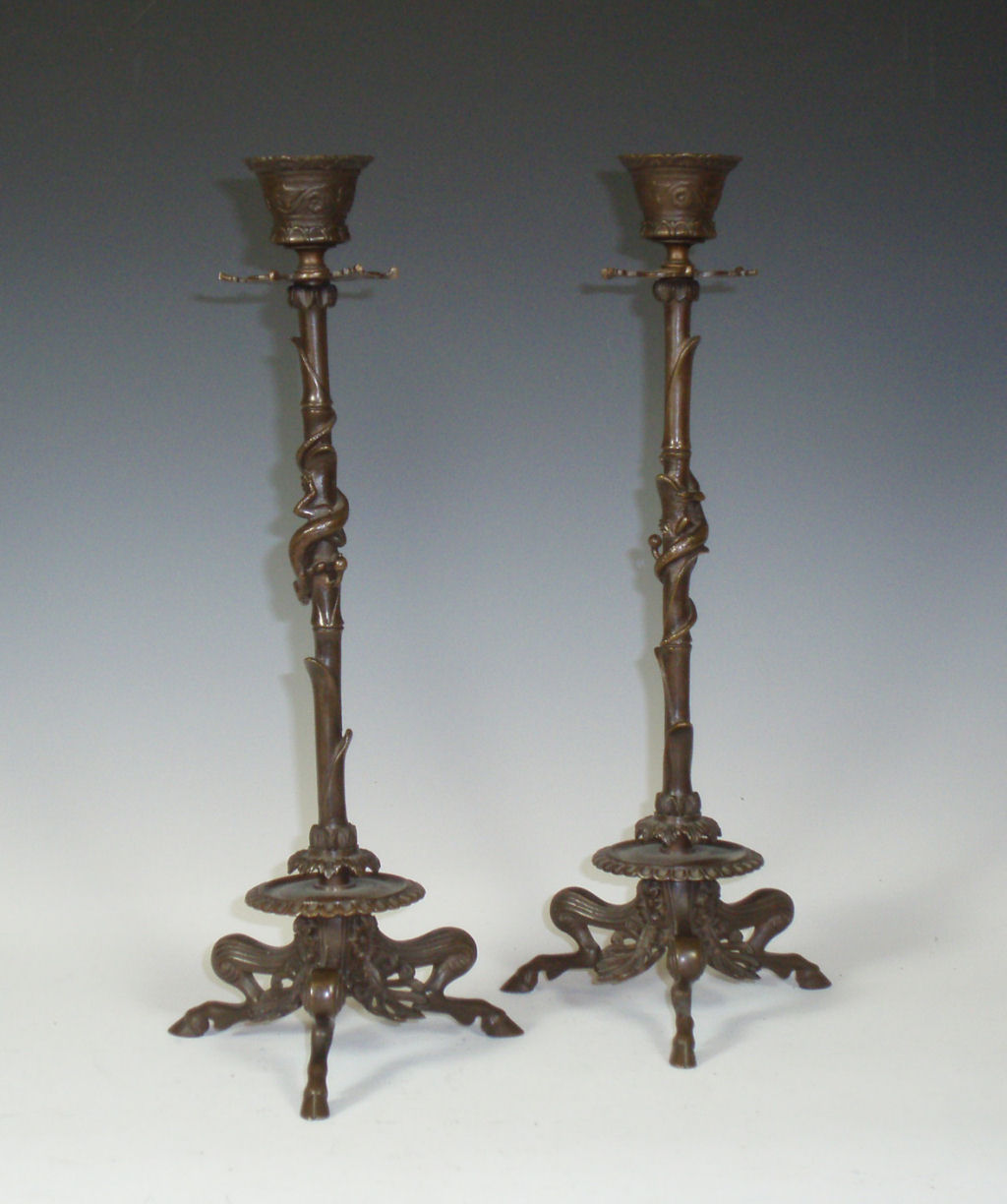 A pair of 19th century French Barbedienne Foundry bronze candlesticks