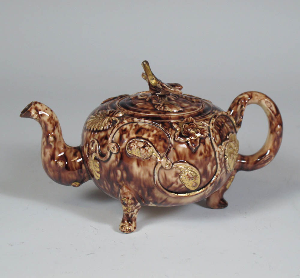 A Staffordshire 'Whieldon type' globular teapot and cover