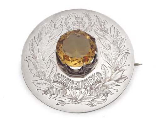 A Scottish silver mounted plaid brooch,