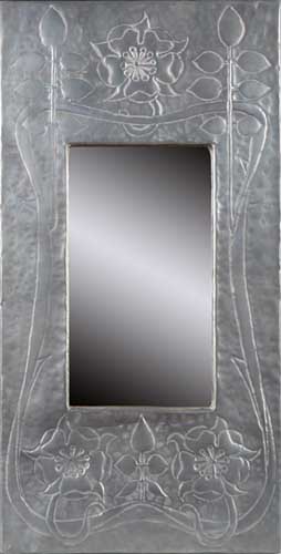 A Scottish School Arts and Crafts pewter wall mirror