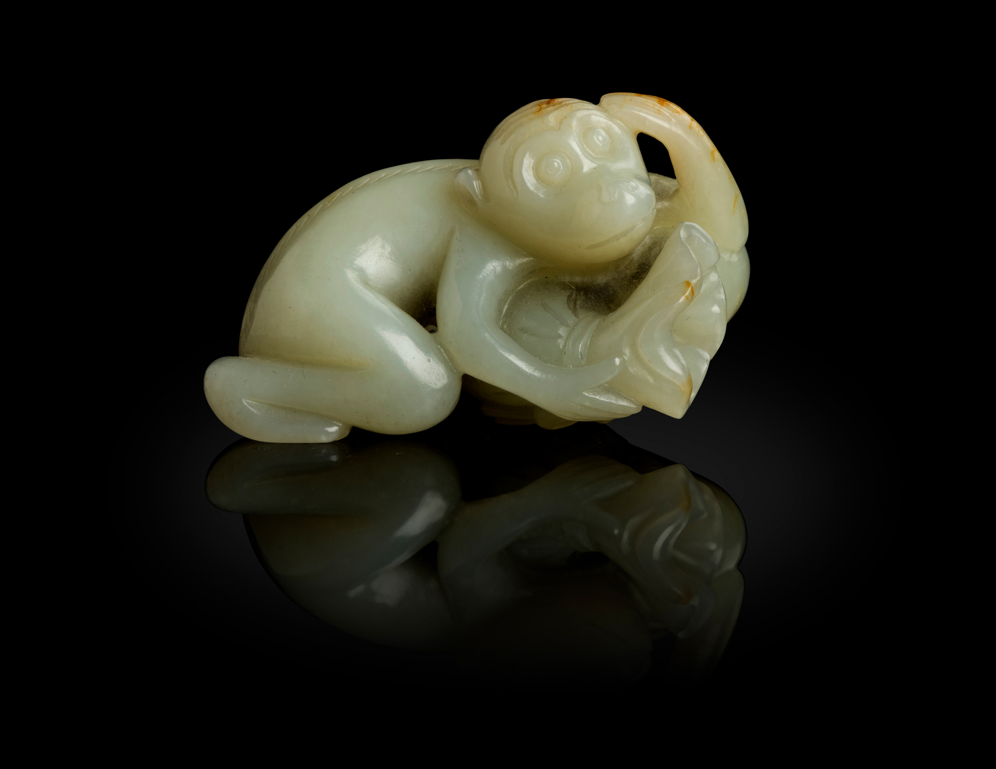 PALE CELADON CARVING OF A MONKEY