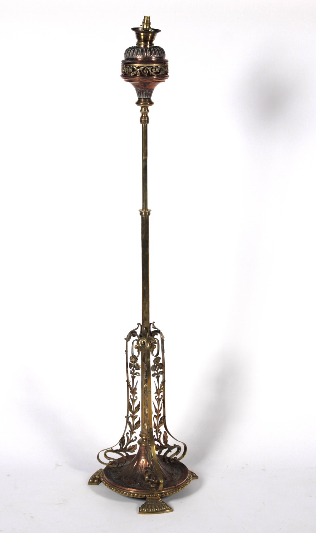 A large Victorian brass and copper standard lamp Stamped 'Hinks & Sons'