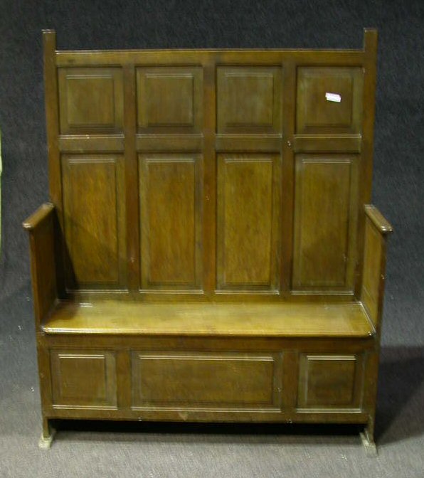 An oak settle,