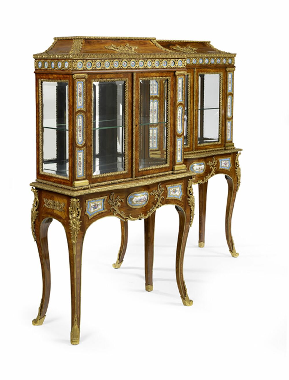 An important pair of Victorian period kingwood, gilt bronze and porcelain mounted display cabinets