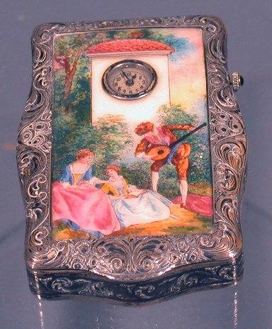 A silver and enamel compact