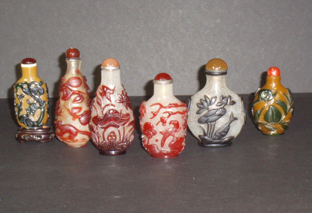 A collection of Chinese overlay glass snuff bottles