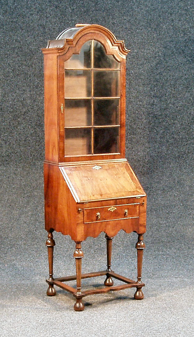 A small William and Mary style walnut bureau bookcase,