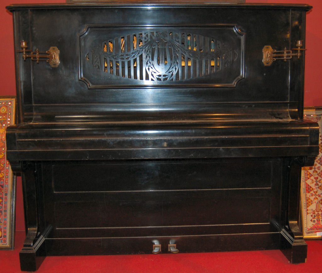 An ebonised upright piano, circa 1908 By C. Bechstein, Berlin