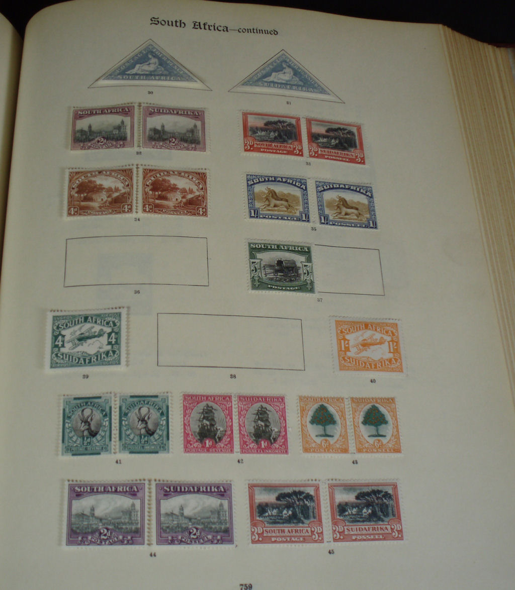 A group of world stamp albums