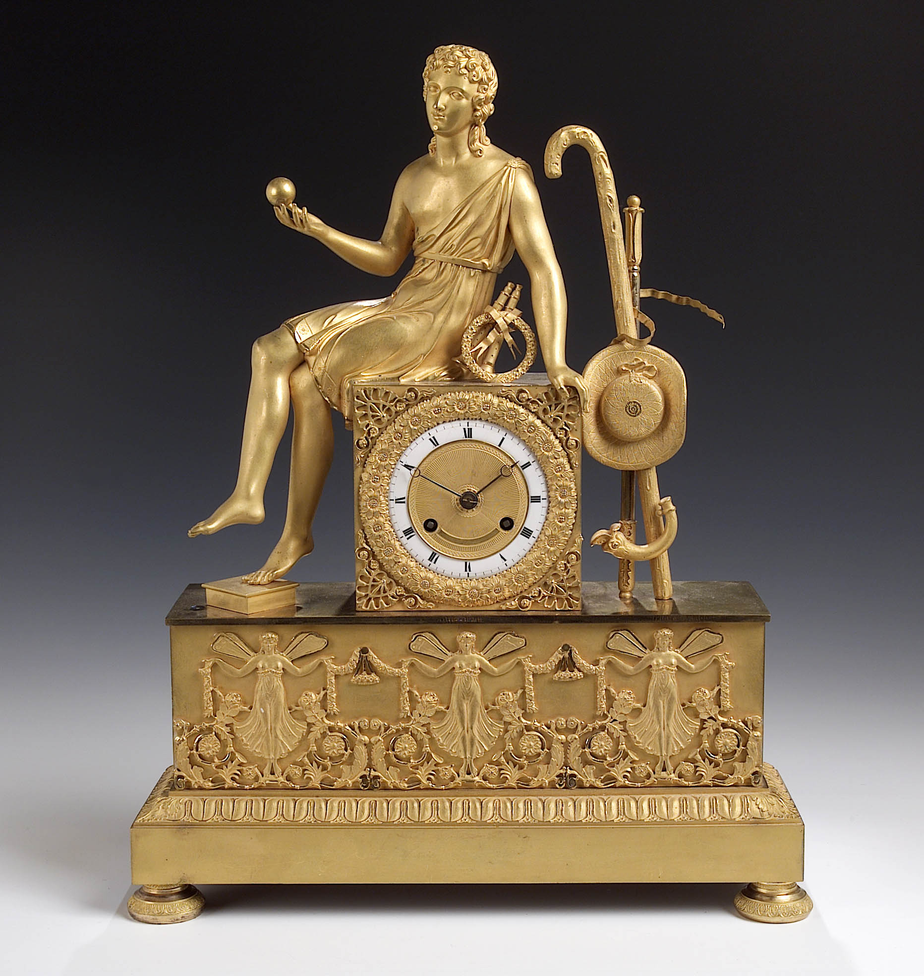 An Empire gilt brass mantel clock