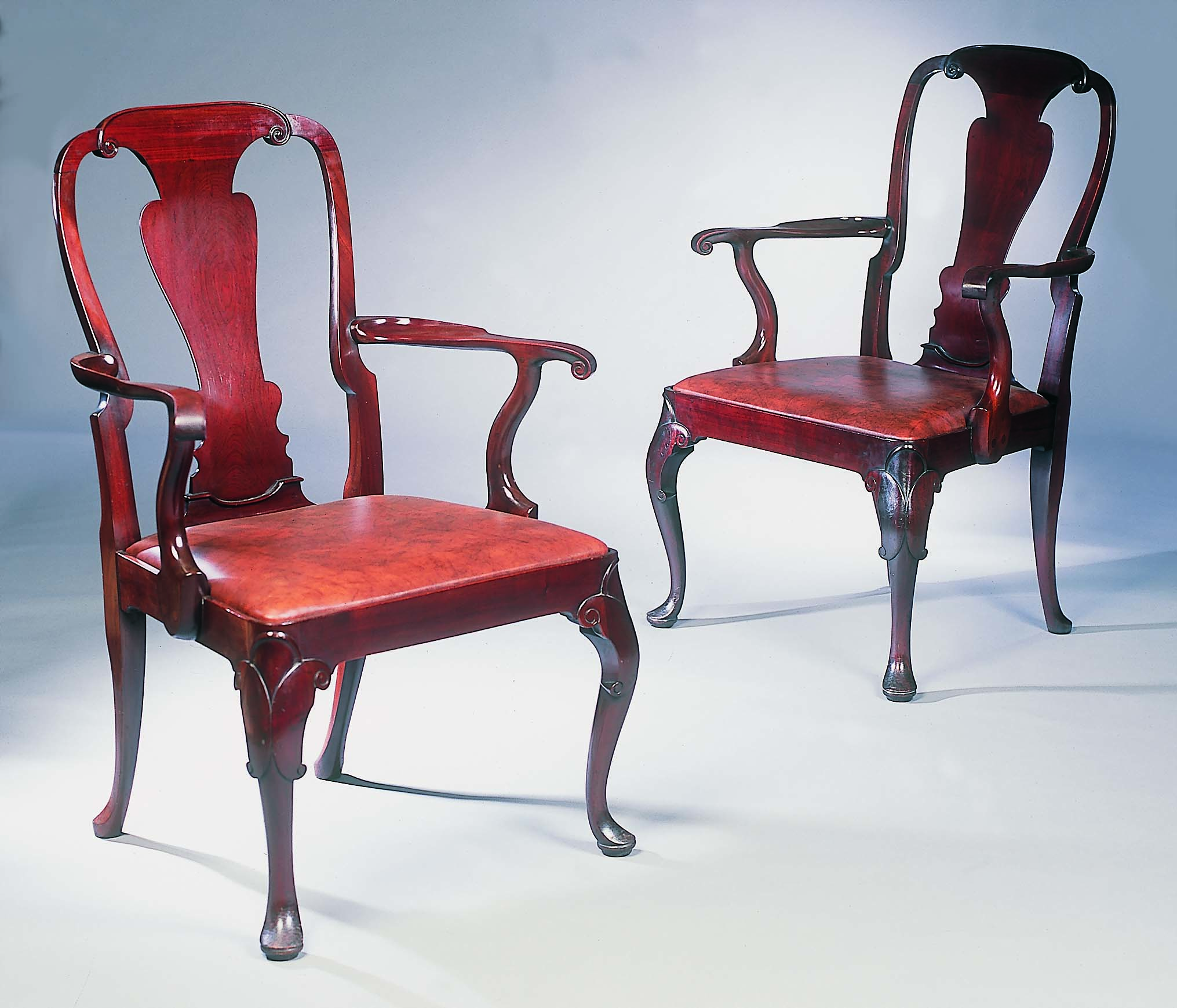 A set of twelve early 20th century George I style open armchairs