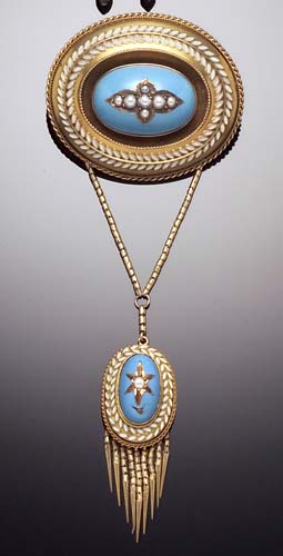 A Victorian gilt metal oval enamel double brooch,