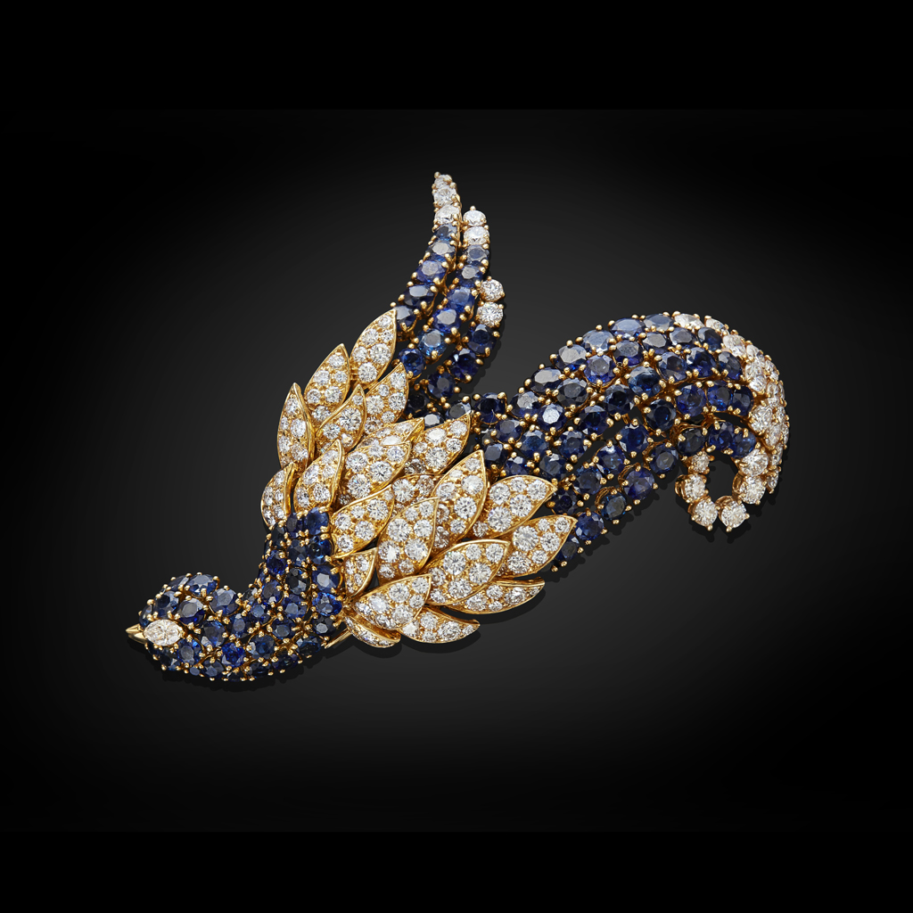 JAHAN GENEVA - A diamond and sapphire set brooch