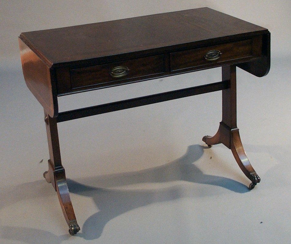 A mahogany and crossbanded sofa table