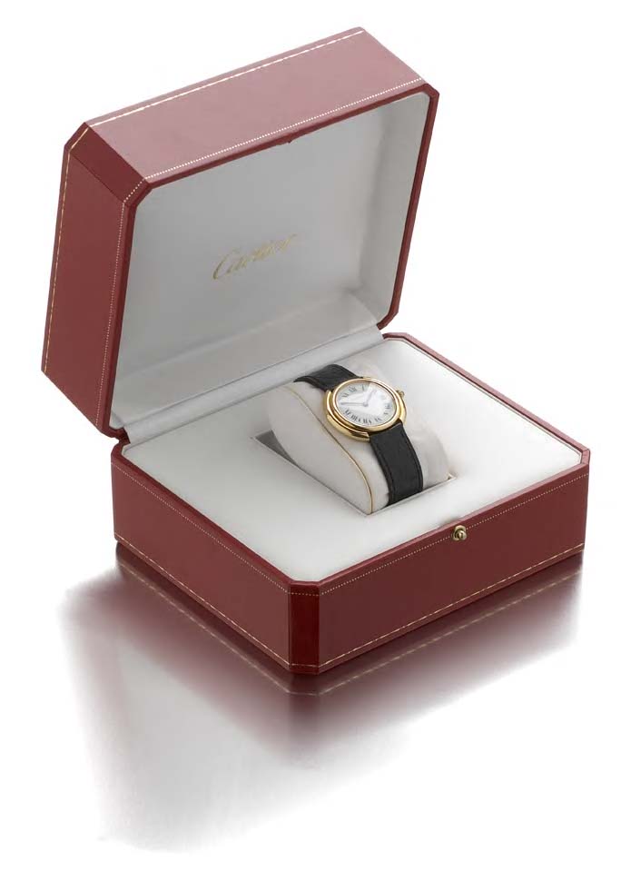 CARTIER - a lady's gold wristwatch,