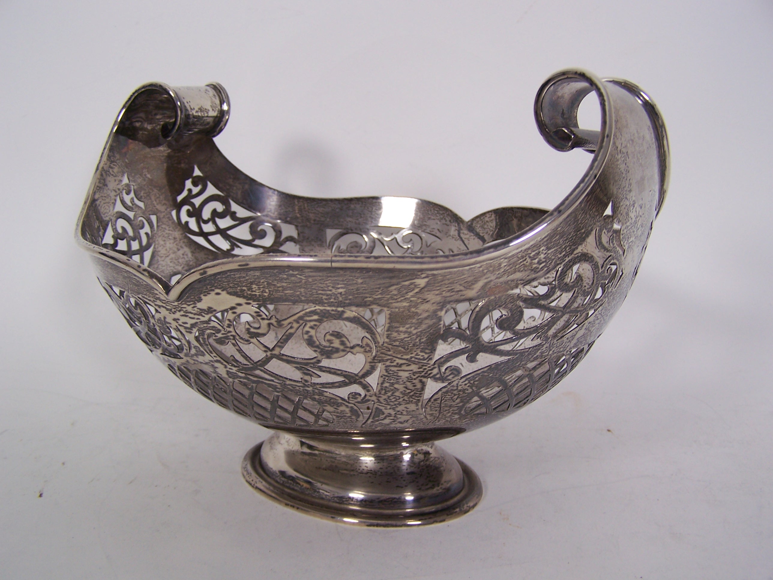 A modern pierced fruit dish