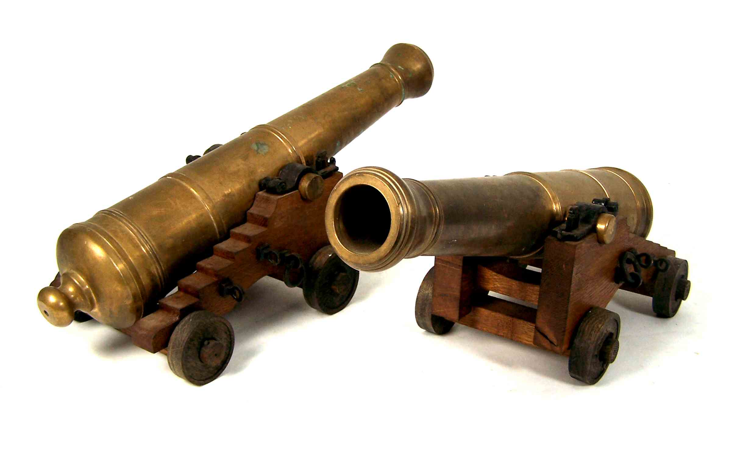 A pair of brass model signal cannons