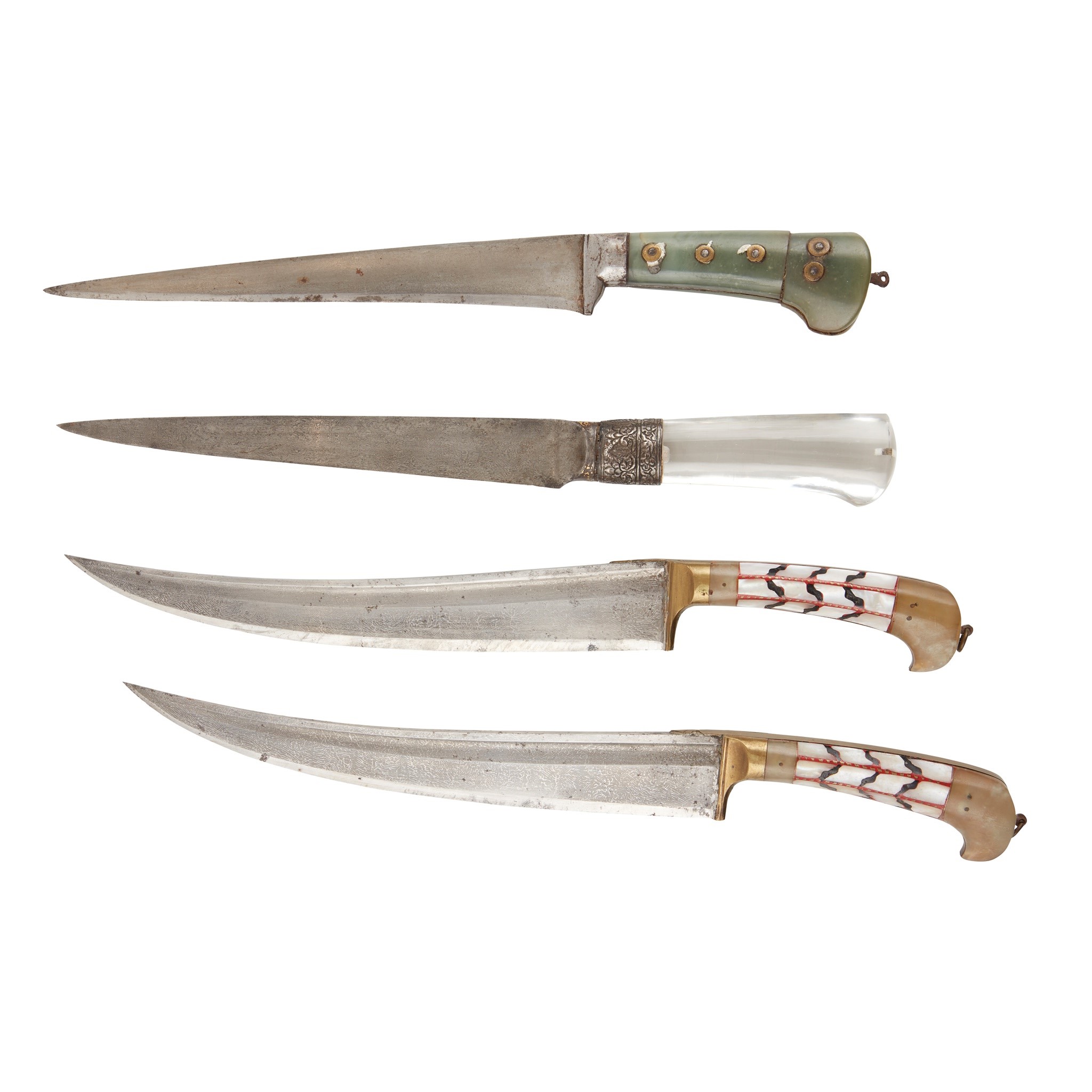 FOUR NORTHERN INDIAN DAGGERS