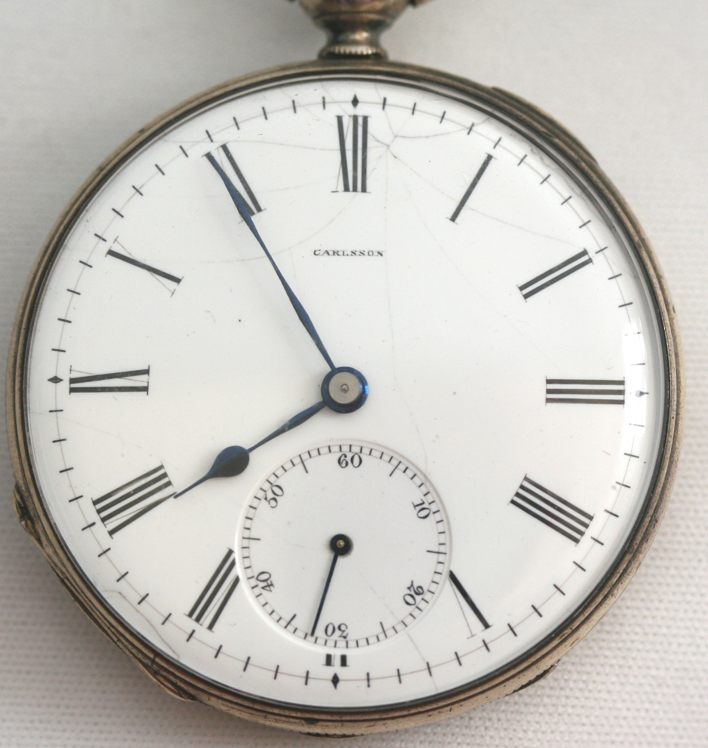 A George III silver pair cased pocket watch