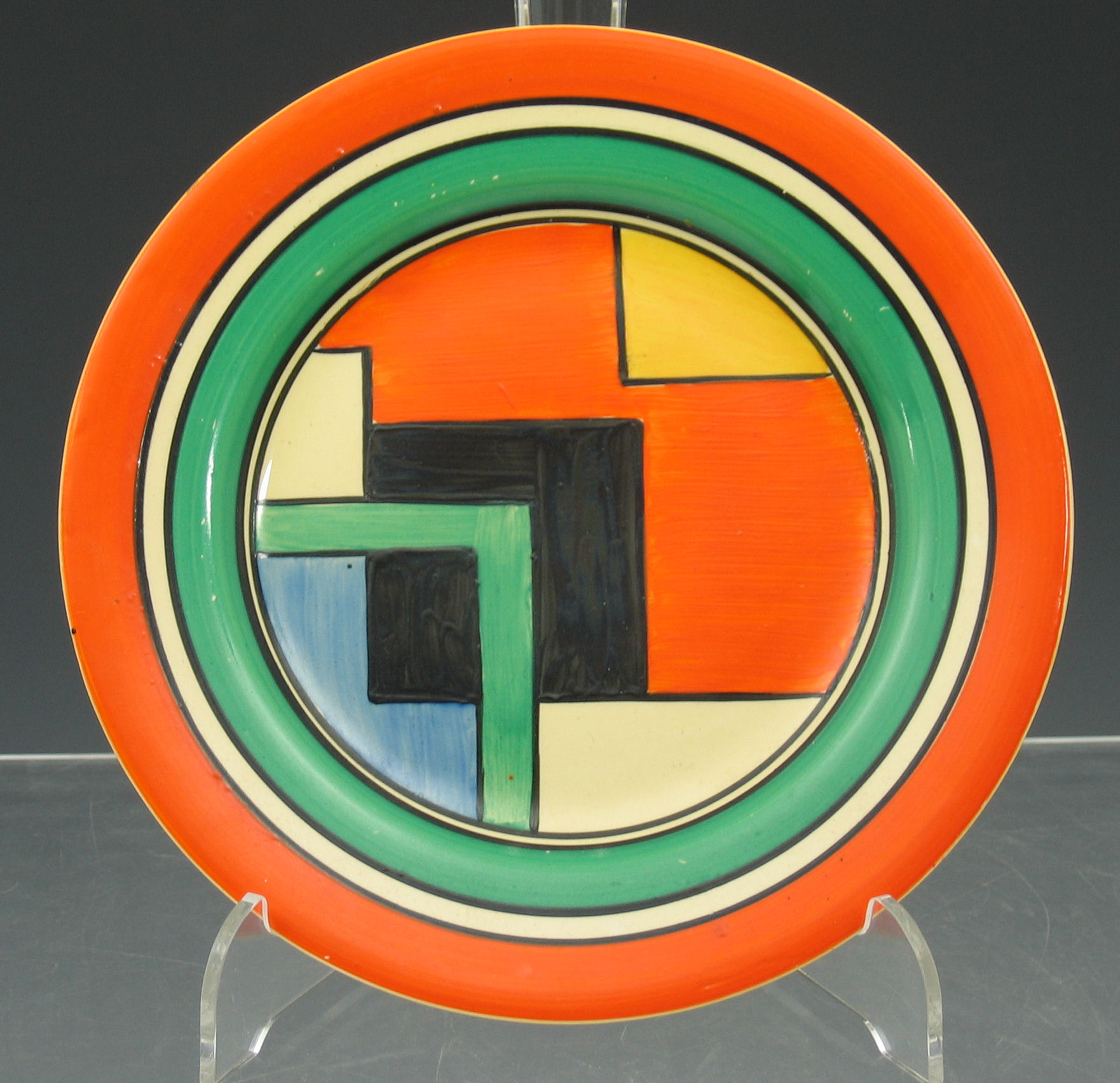 A Clarice Cliff circular plate,