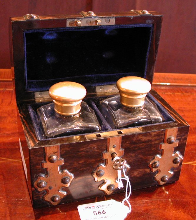 A Victorian coromandel and brass bound casket