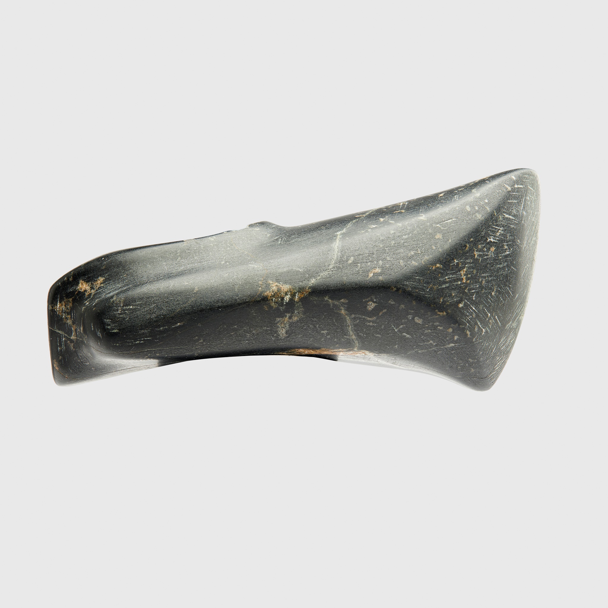 A CARVED ANCIENT NORDIC BOAT AXE