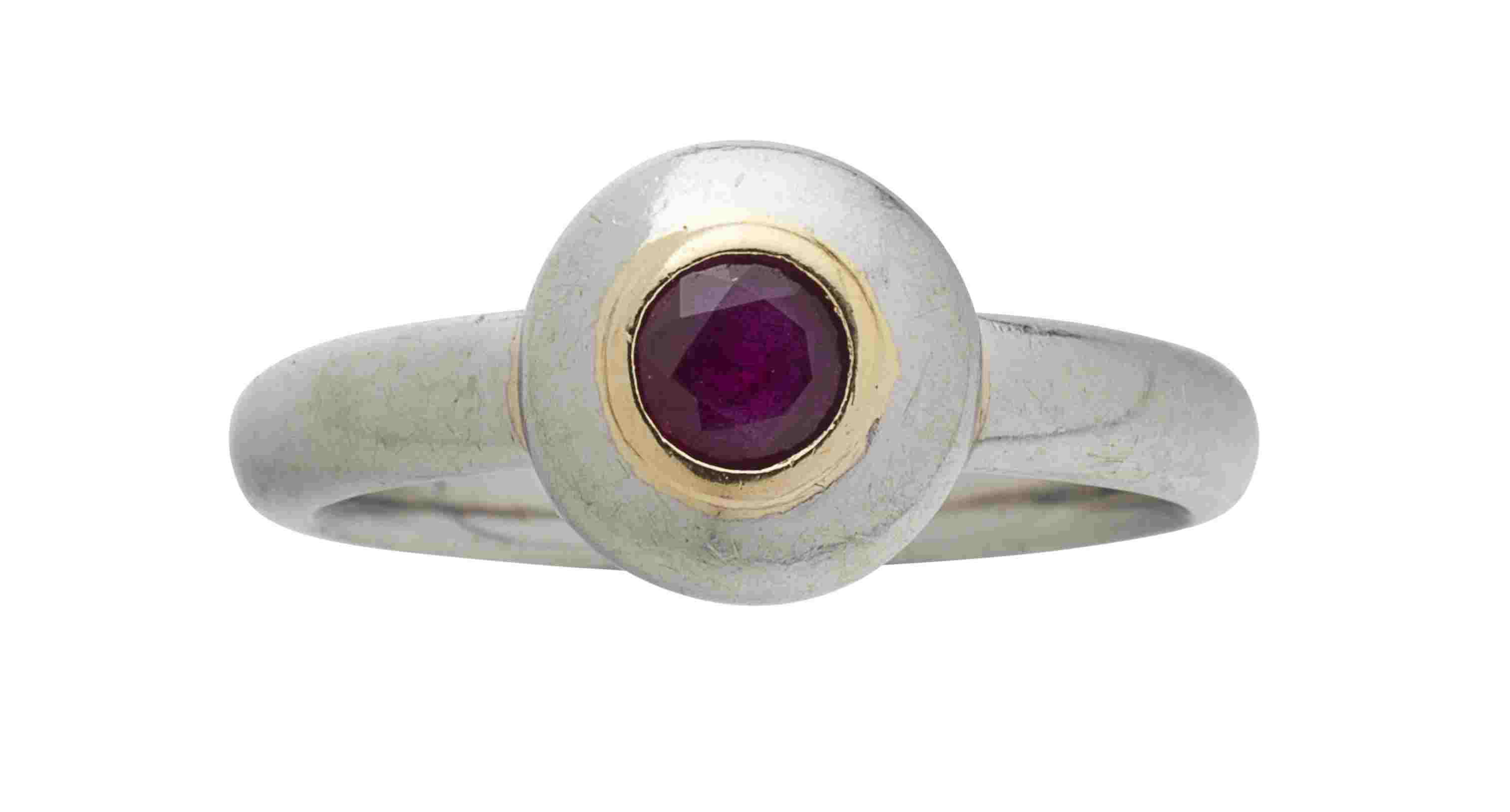 GRAHAM STEWART - A bespoke platinum and ruby set ring