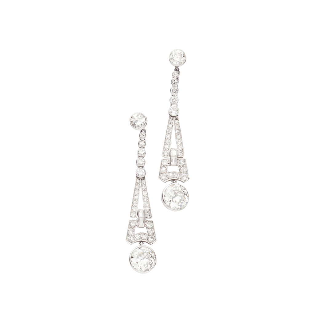 A pair of Art Deco diamond set pendant earrings