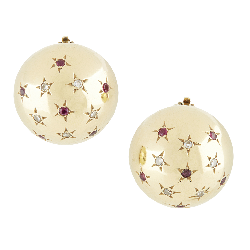 A pair of ruby and diamond set earrings