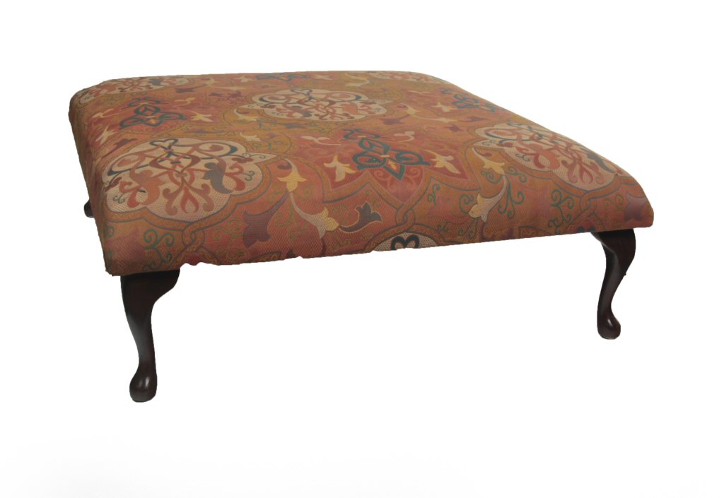 A large Georgian style foot stool