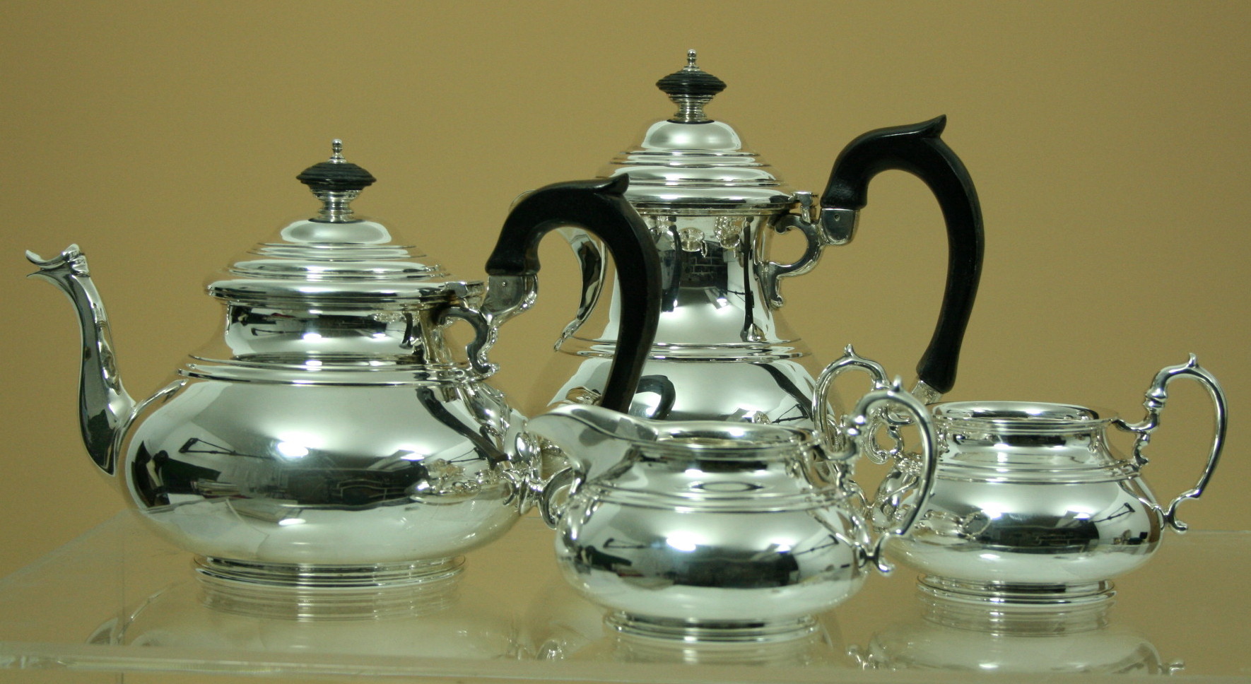 A four-piece silver tea service