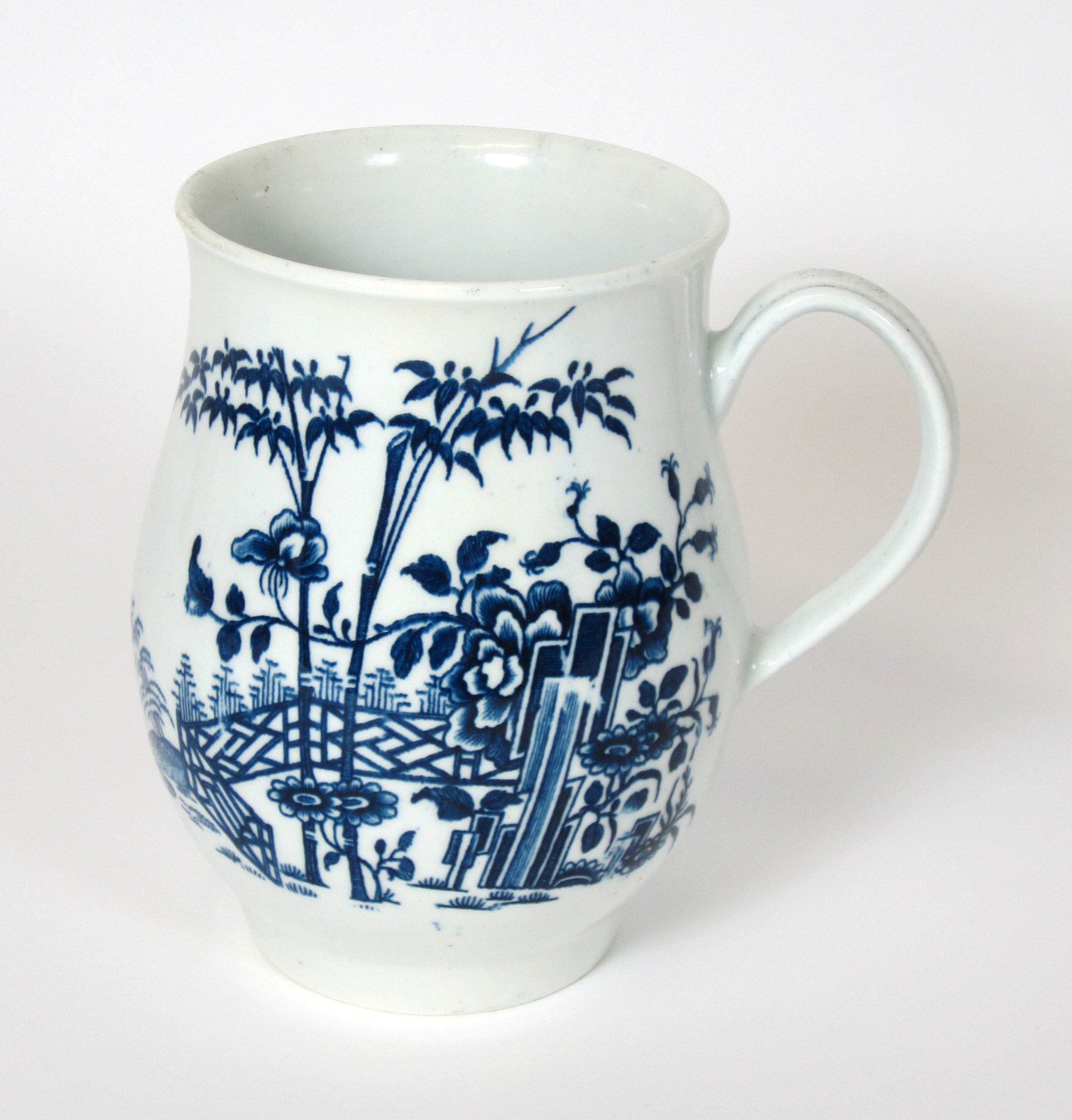 EARLY ENGLISH BLUE AND WHITE PORCELAIN TANKARD