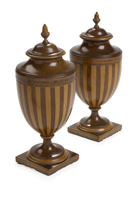 A pair of George III period mahogany and pearwood tea caddies