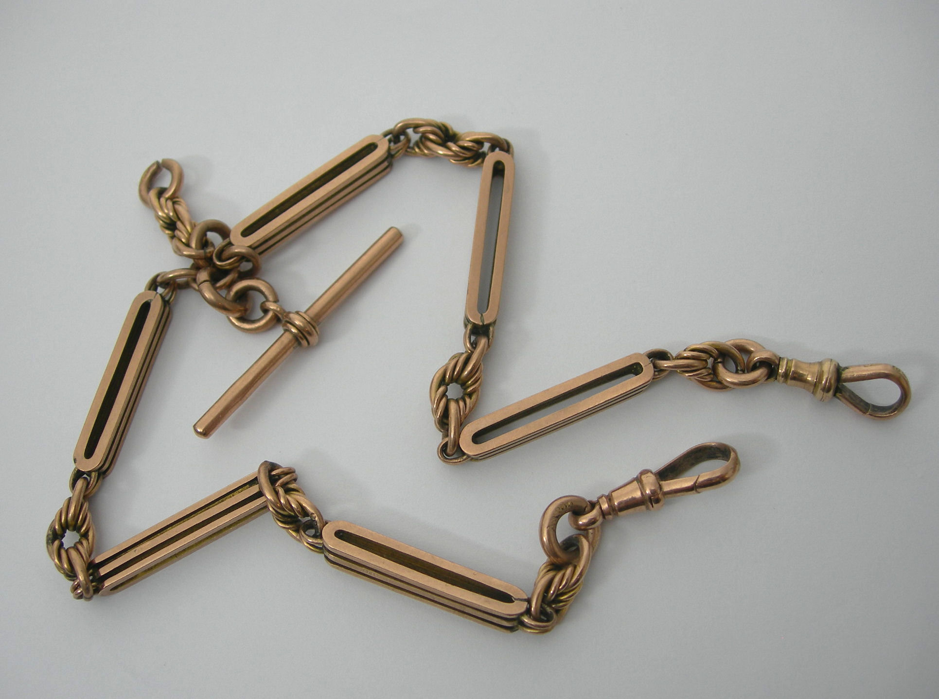 A 9ct gold double Albert chain,