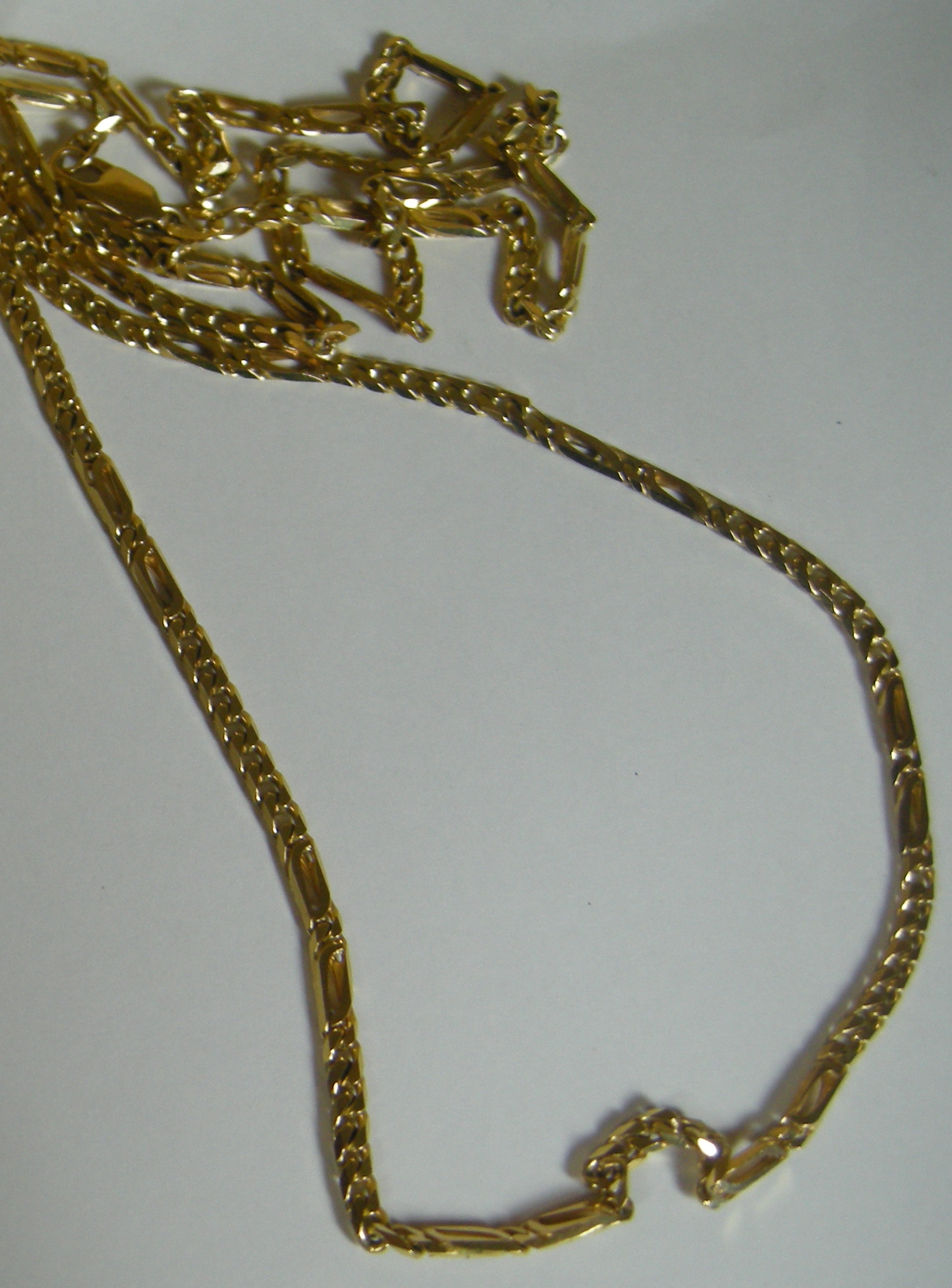 A pair of 9ct gold necklaces